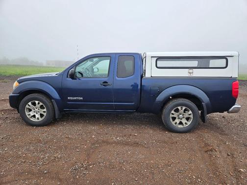Blue 2011 Suzuki Equator Sport