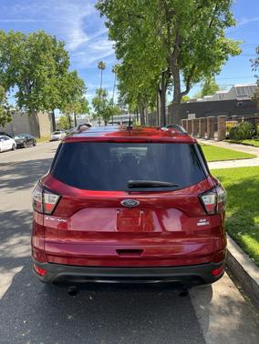 Red 2017 Ford Escape SE
