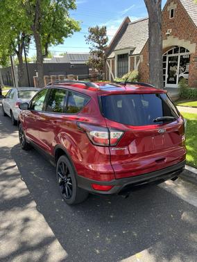 Red 2017 Ford Escape SE