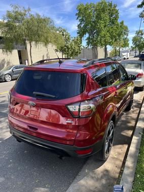 Red 2017 Ford Escape SE