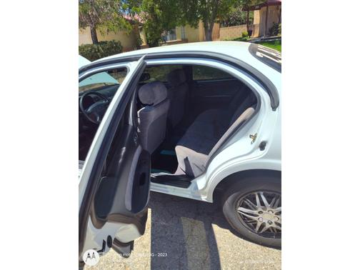 White 1997 Nissan Maxima SE