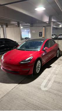 Red 2021 Tesla Model 3 Standard Range Plus
