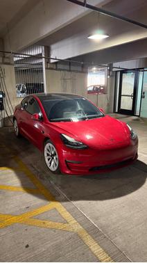 Red 2021 Tesla Model 3 Standard Range Plus