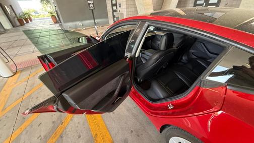 Red 2021 Tesla Model 3 Standard Range Plus