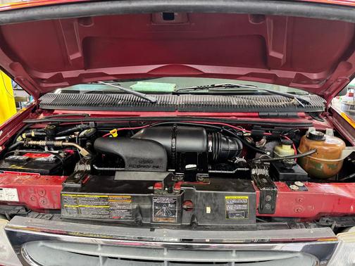 Red 1999 Ford E150 Base