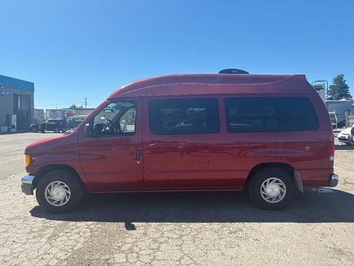 Red 1999 Ford E150 Base