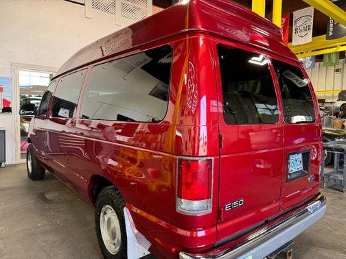 Red 1999 Ford E150 Base