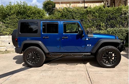 Blue 2009 Jeep Wrangler Unlimited X