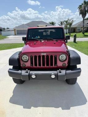 Red 2012 Jeep Wrangler Sport