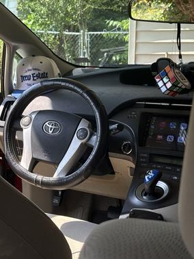 Red 2010 Toyota Prius III