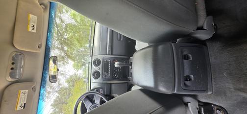 Red 2007 Jeep Liberty Sport