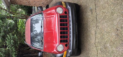 Red 2007 Jeep Liberty Sport