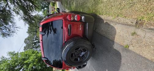 Red 2007 Jeep Liberty Sport