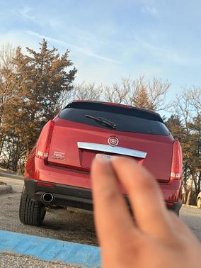 Red 2010 Cadillac SRX Premium Collection