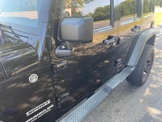 Black 2011 Jeep Wrangler Unlimited Sport