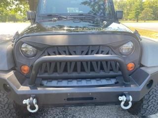 Black 2011 Jeep Wrangler Unlimited Sport