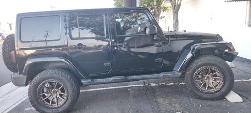 Black 2017 Jeep Wrangler Unlimited Sahara
