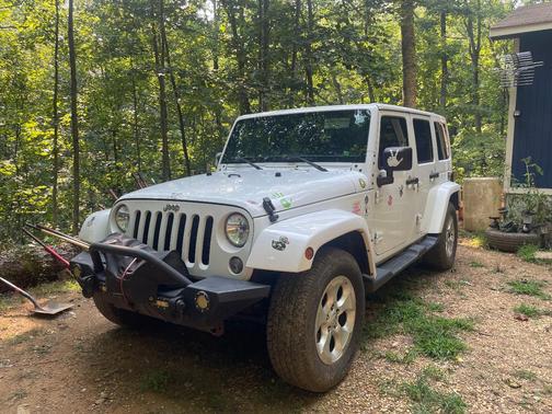 White 2015 Jeep Wrangler Unlimited Sahara