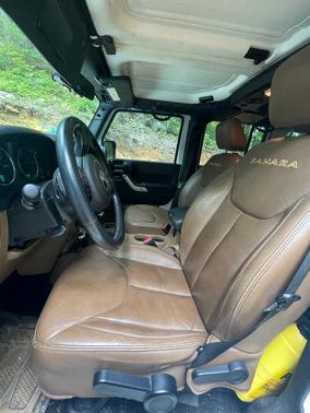 White 2015 Jeep Wrangler Unlimited Sahara