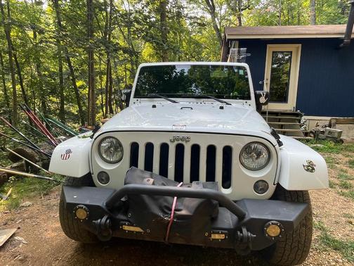 White 2015 Jeep Wrangler Unlimited Sahara