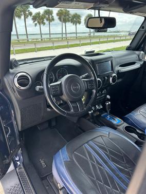 Blue 2013 Jeep Wrangler Sahara