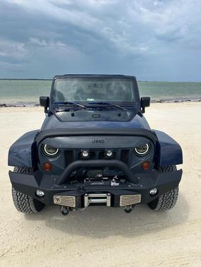 Blue 2013 Jeep Wrangler Sahara