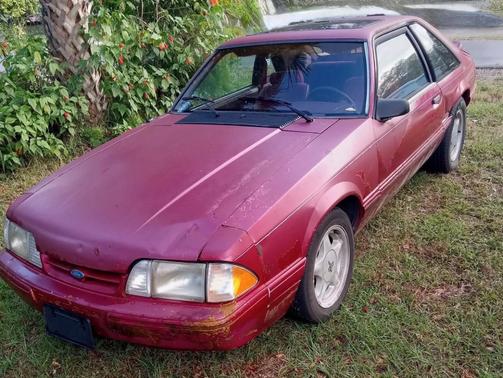 Red 1993 Ford Mustang LX