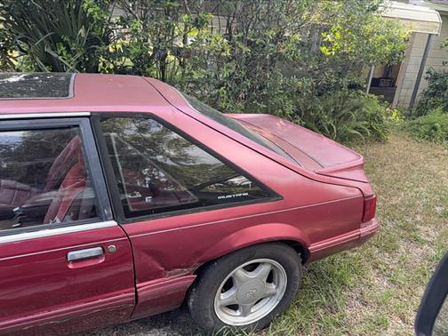 Red 1993 Ford Mustang LX