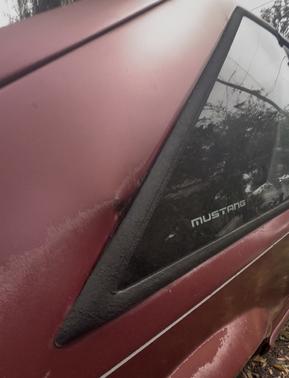 Red 1993 Ford Mustang LX