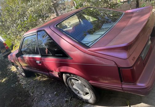 Red 1993 Ford Mustang LX