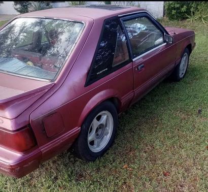 Red 1993 Ford Mustang LX