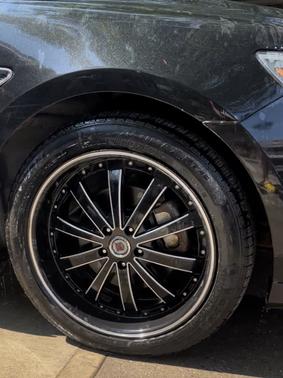 Black 2015 Ford Taurus SEL