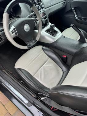 Black 2008 Saturn Sky Red Line Carbon Flash SE