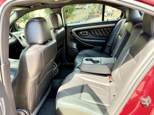 Red 2016 Ford Taurus SEL