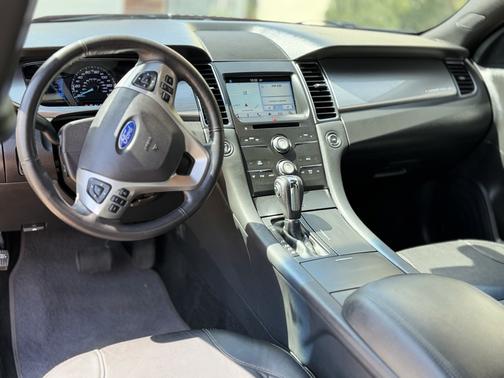 Red 2016 Ford Taurus SEL