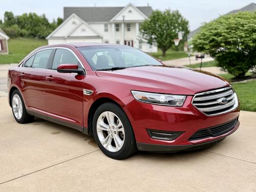 Red 2016 Ford Taurus SEL