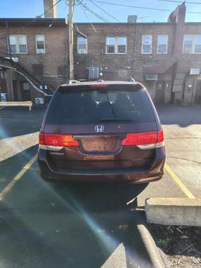 Red 2010 Honda Odyssey EX-L