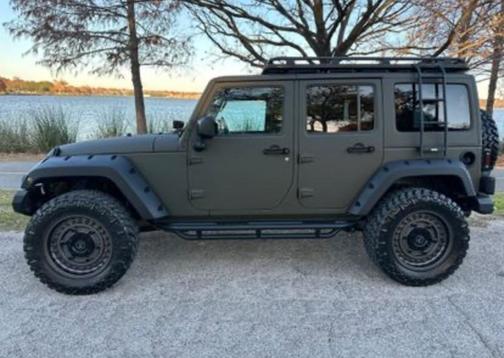 Green 2015 Jeep Wrangler Unlimited Sahara