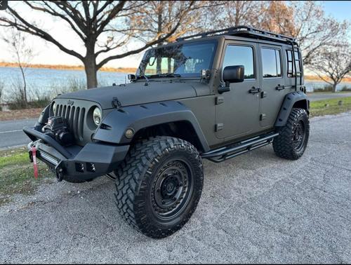 Green 2015 Jeep Wrangler Unlimited Sahara