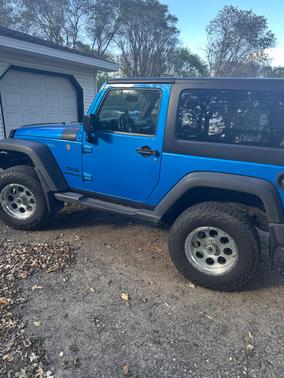 Blue 2016 Jeep Wrangler Sport