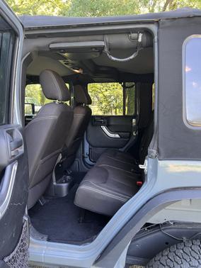 Blue 2015 Jeep Wrangler Unlimited Sahara