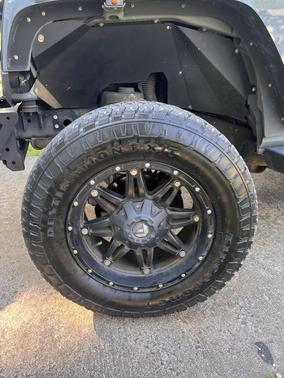 Blue 2015 Jeep Wrangler Unlimited Sahara