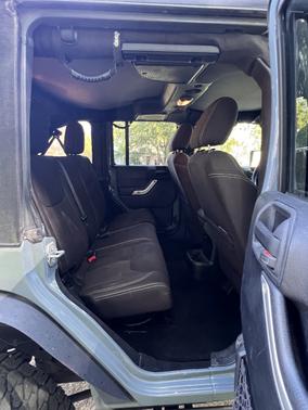 Blue 2015 Jeep Wrangler Unlimited Sahara