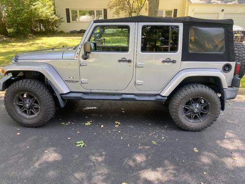 Silver 2016 Jeep Wrangler Unlimited Sahara