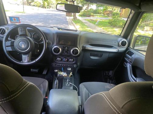 Silver 2016 Jeep Wrangler Unlimited Sahara