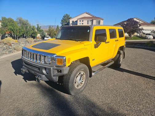 Yellow 2006 Hummer H3 Base