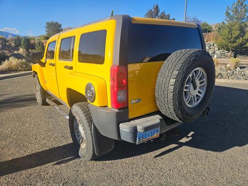 Yellow 2006 Hummer H3 Base