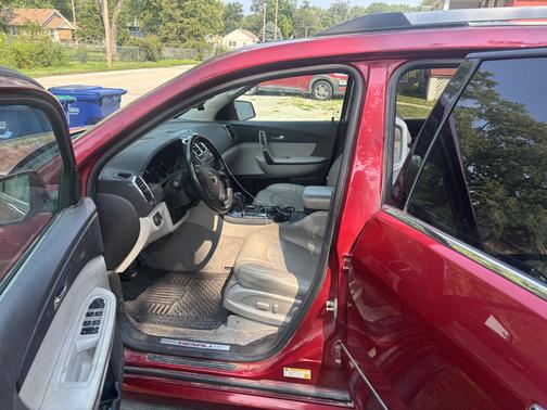 Red 2012 GMC Acadia Denali