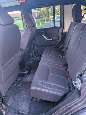 Gray 2014 Jeep Wrangler Unlimited Sahara