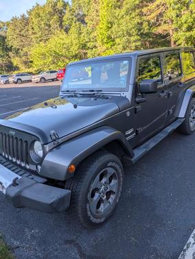 Gray 2014 Jeep Wrangler Unlimited Sahara